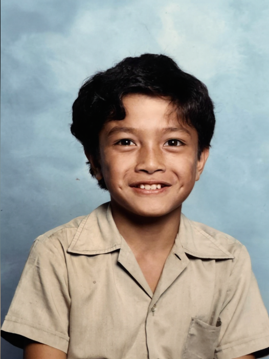 Michael Le at Kingsgrove Primary School, age 9. By eight he was already working at his father's takeaway shop. By ten he had a newspaper run before school.