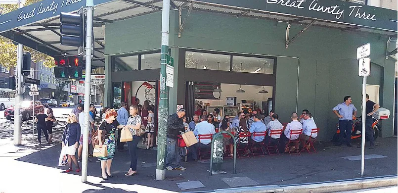 Great Aunty Three on a Surry Hills corner, every outdoor seat full and a queue of people waiting on the footpath.